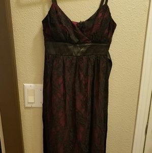 Black lace over maroon Dress.
